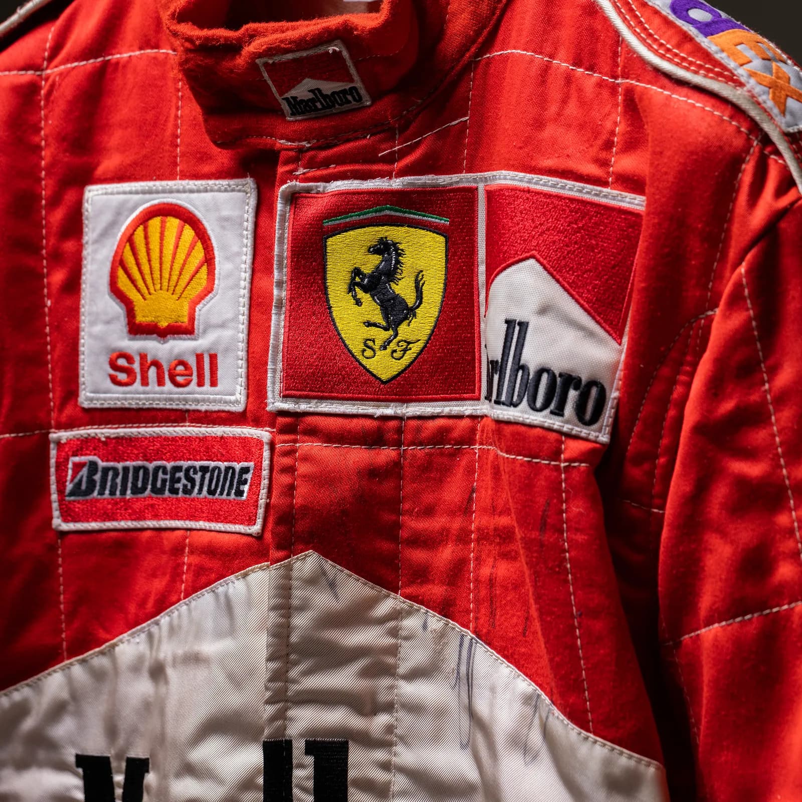 Tuta Eddie Irvine 1999 autografata